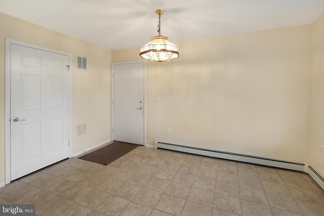 empty room featuring a chandelier and a baseboard radiator