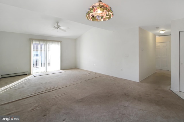 empty room with ceiling fan, light colored carpet, and a baseboard heating unit