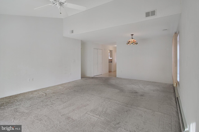 unfurnished room with light carpet, ceiling fan, and a baseboard radiator