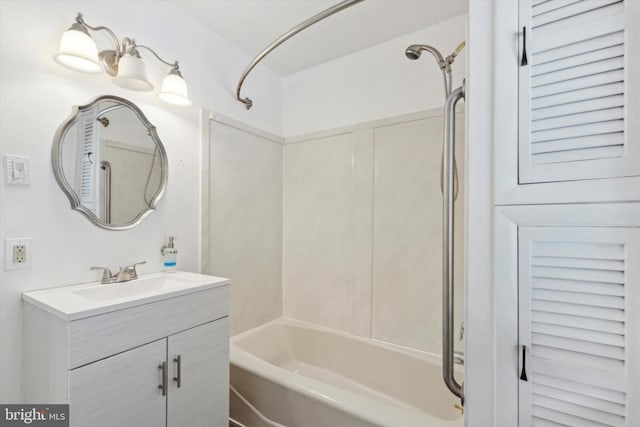 bathroom featuring vanity and shower / bath combination