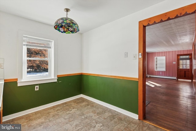 empty room with a baseboard radiator