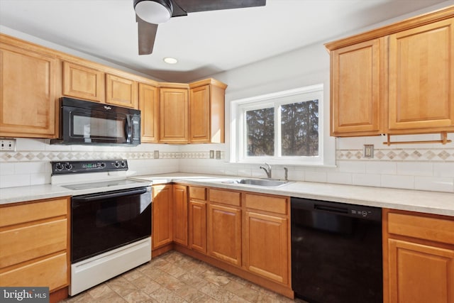 kitchen with sink, tasteful backsplash, ceiling fan, and black appliances