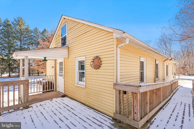 view of snow covered property