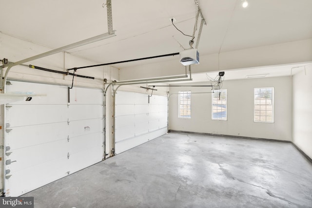 garage featuring a garage door opener