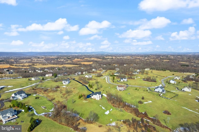 birds eye view of property with a rural view