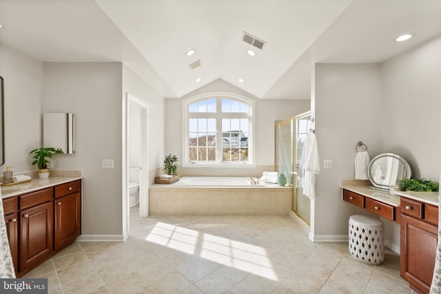 full bathroom with shower with separate bathtub, lofted ceiling, vanity, toilet, and tile patterned floors