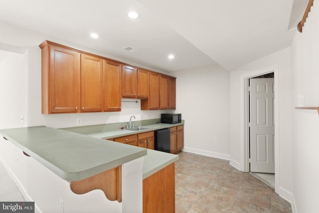 kitchen with black appliances, sink, and kitchen peninsula