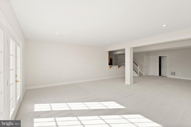 basement with light carpet