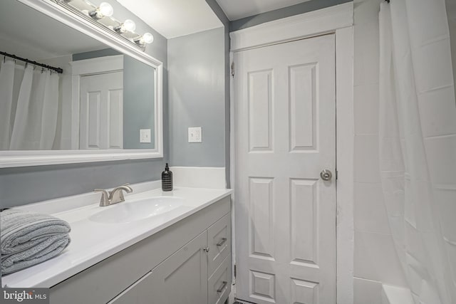 bathroom featuring vanity and walk in shower