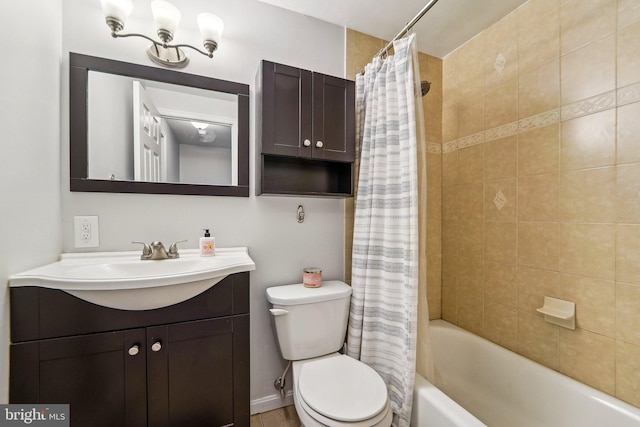 full bathroom with toilet, vanity, and shower / bath combo with shower curtain