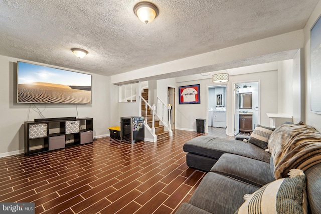 living room with washer / clothes dryer