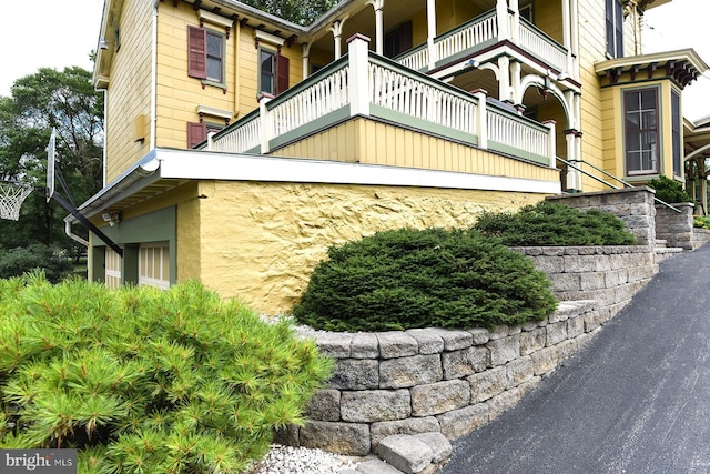 view of home's exterior featuring a balcony