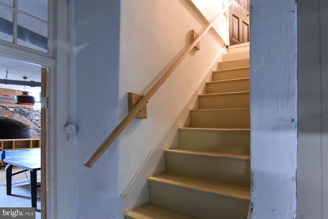 stairs with tile patterned flooring