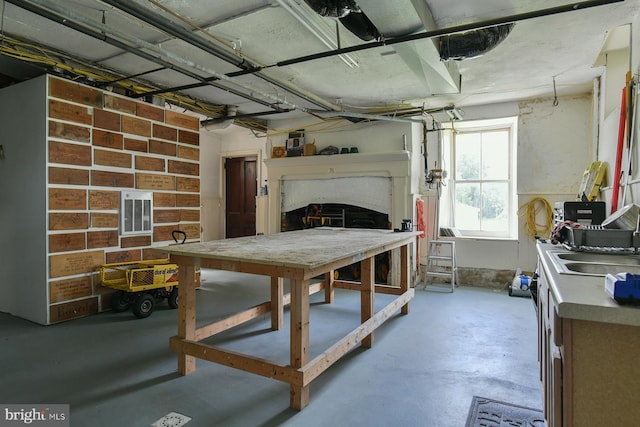 garage featuring a workshop area and sink