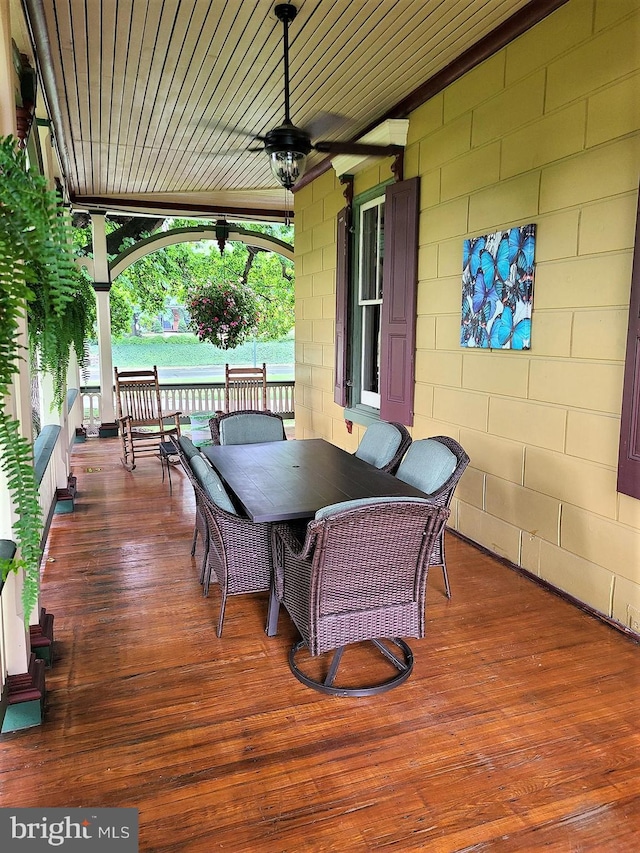 wooden terrace with ceiling fan