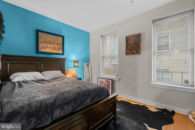 bedroom featuring hardwood / wood-style flooring