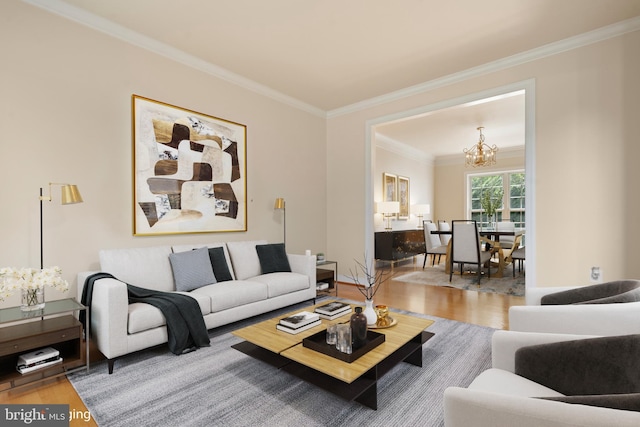 living room featuring crown molding, an inviting chandelier, and wood finished floors