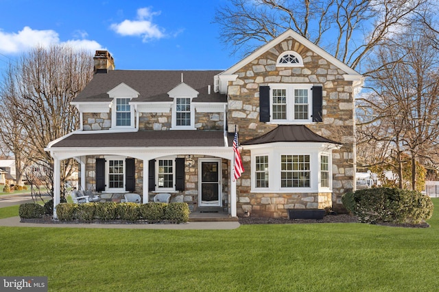 view of property with a front lawn