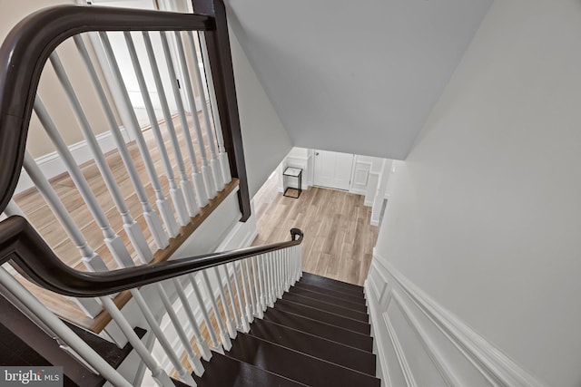 staircase featuring hardwood / wood-style floors