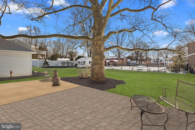 view of patio with an outbuilding