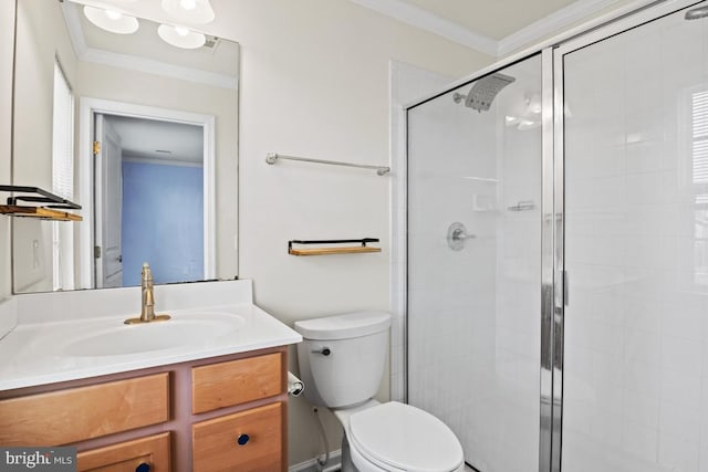 full bathroom featuring toilet, a stall shower, crown molding, and vanity