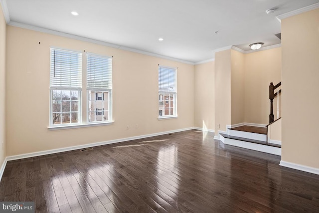 interior space with dark wood-style flooring, visible vents, stairway, ornamental molding, and baseboards