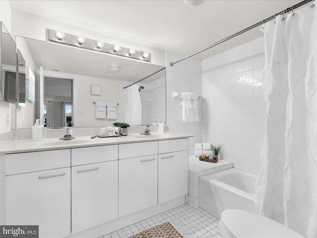 full bathroom featuring shower / tub combo, vanity, toilet, and tile patterned flooring