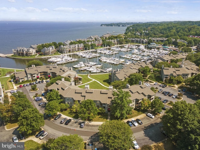 birds eye view of property featuring a water view