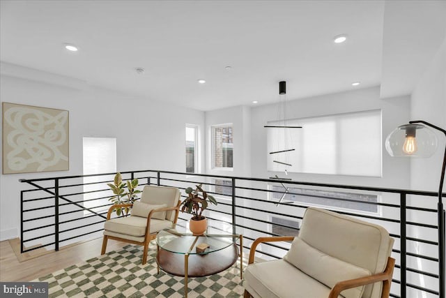 sitting room with light hardwood / wood-style flooring