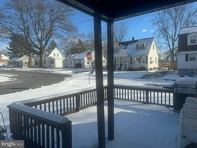 view of snow covered deck