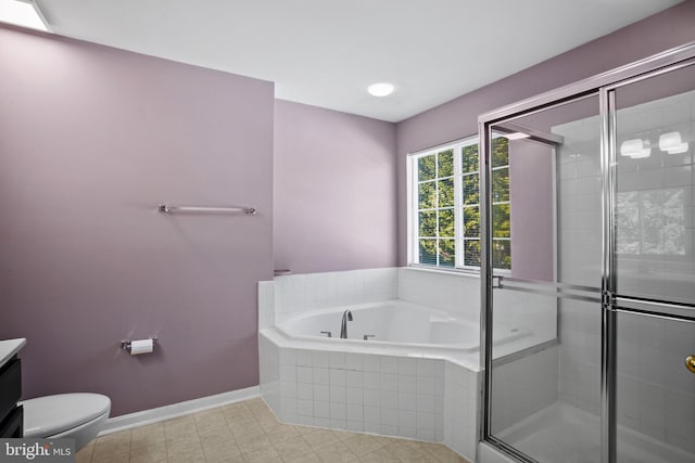 full bathroom featuring toilet, shower with separate bathtub, and vanity