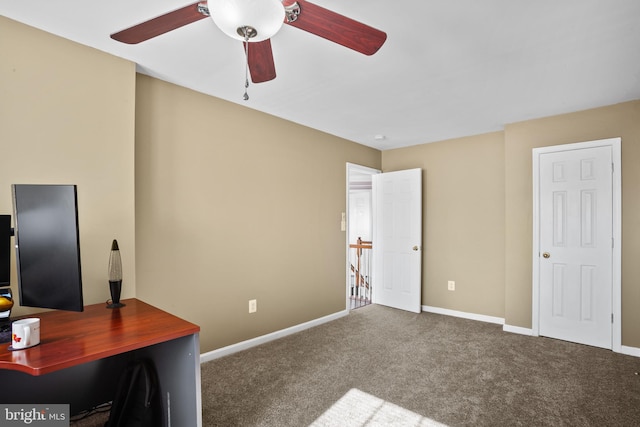 office featuring ceiling fan and carpet