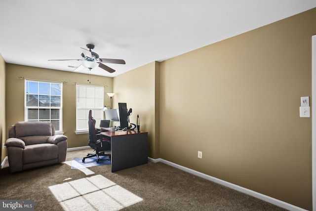 office space featuring carpet floors and ceiling fan