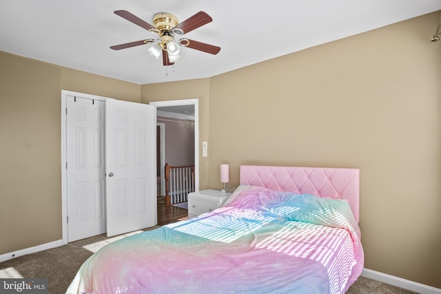 bedroom featuring carpet floors, ceiling fan, and a closet