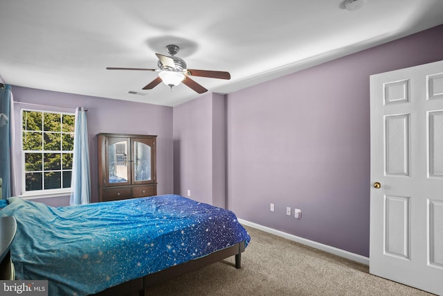 bedroom featuring carpet floors and ceiling fan