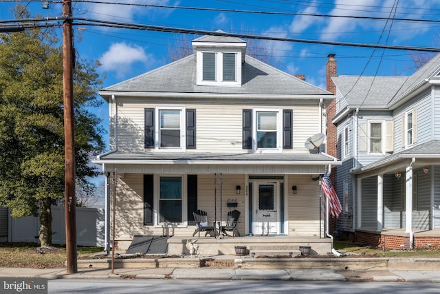 view of front property with covered porch