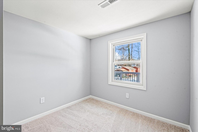 view of carpeted spare room