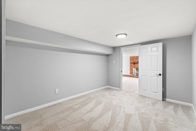 basement with light colored carpet