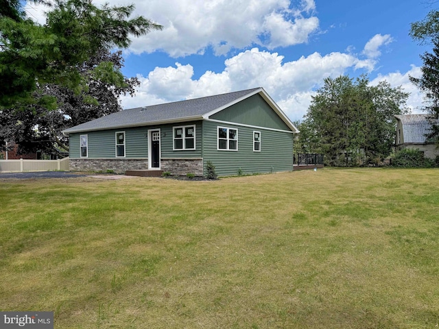 view of front of home with a front lawn