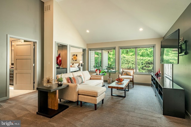 sunroom featuring vaulted ceiling