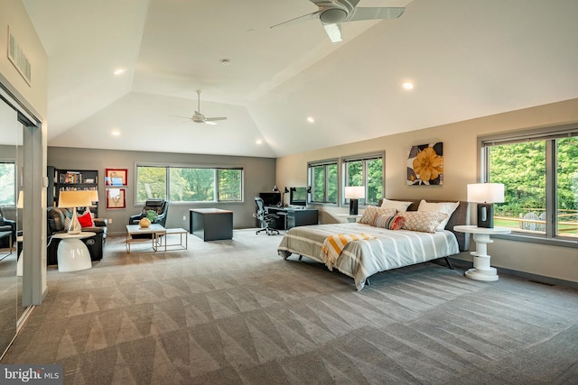 bedroom with carpet flooring, ceiling fan, and vaulted ceiling