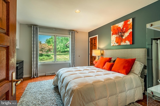 bedroom featuring light wood-type flooring