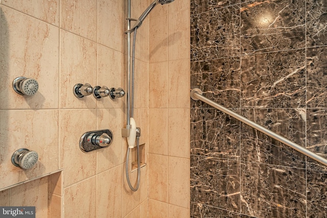 details featuring a tile shower