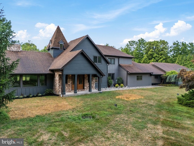 view of front of home with a front yard