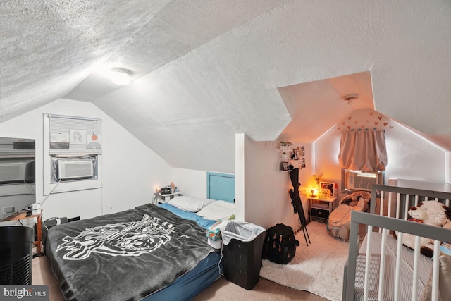 carpeted bedroom featuring a textured ceiling, cooling unit, and vaulted ceiling