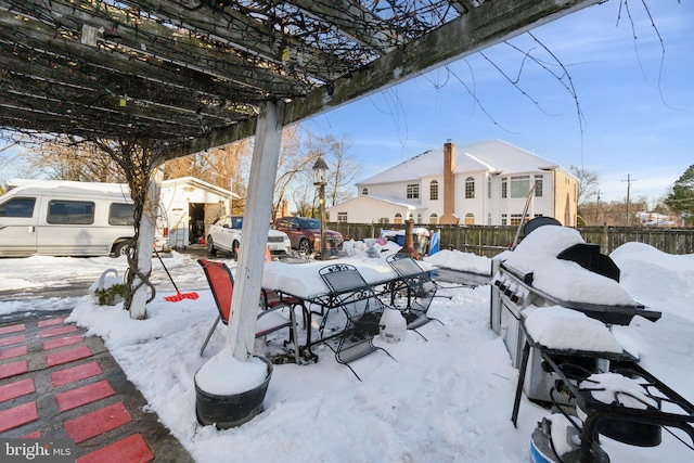 view of yard layered in snow