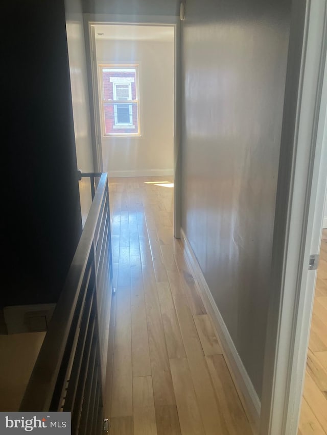 corridor featuring light wood-type flooring