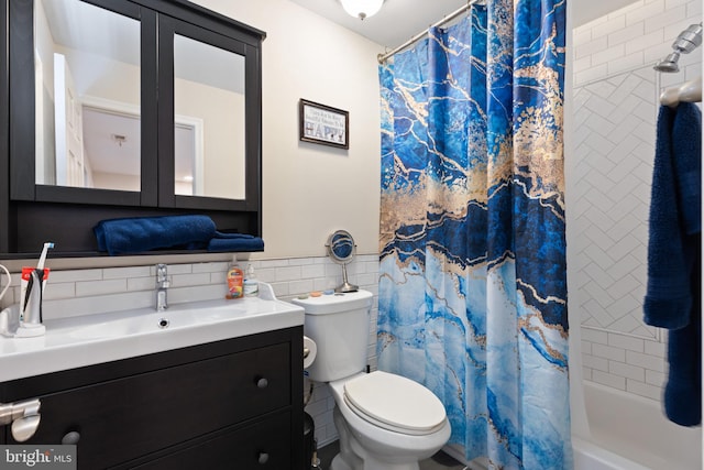 full bathroom with shower / bathtub combination with curtain, backsplash, toilet, vanity, and tile walls