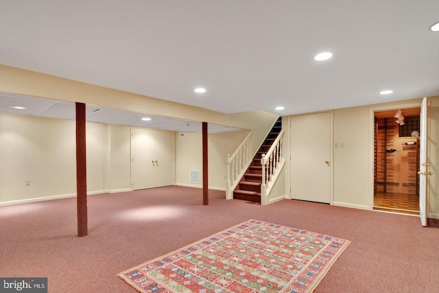 basement with carpet flooring