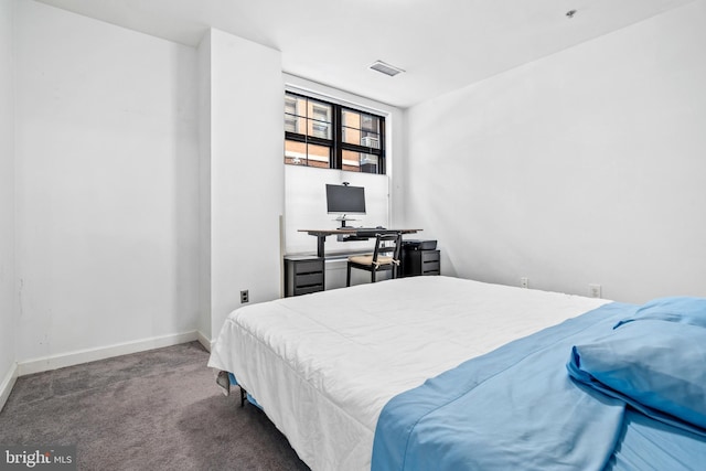 bedroom featuring carpet